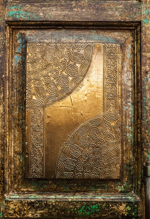 Traditional furniture handmade in India. in the Indian market. Antique furniture. Old paint. Brass inlay. Stamping.の写真素材