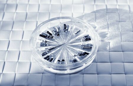 Set of metal Dentist 's medical equipment tools. Toned image.の写真素材