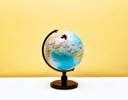 globe made of puzzle pieces, business and technology concept.