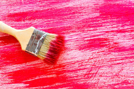 Brushes and paints. Image board with red paint.の写真素材