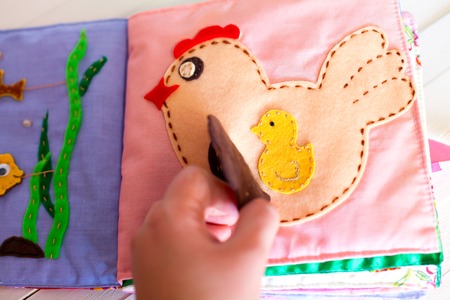 Soft logical manual book for children. Pages books for the mind growth and motility. Touch handmade...
