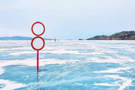 Warning traffic sign on Baikal ice crossing to Olkhon island..
