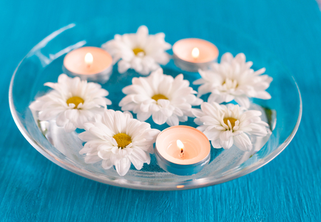 Aroma Bowl with floating candles and flowers.の写真素材