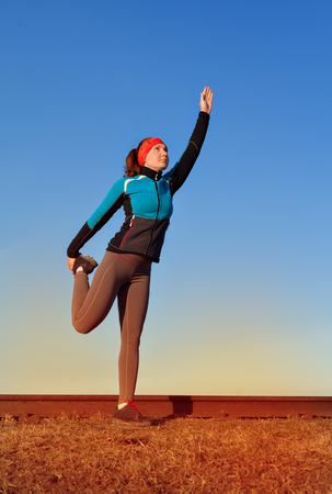 Beautiful woman doing workout runner during a morning workout, workout before joggingの写真素材
