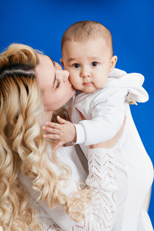 Mom kissing babyの写真素材