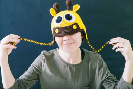 Cheerful female in knitted hatの写真素材