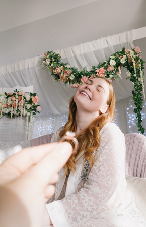 Man giving ring to womanの写真素材