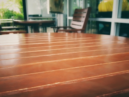 Wooden table set in front of the shop
