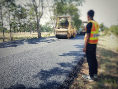 Asphalt road construction in Thailand, blurred images