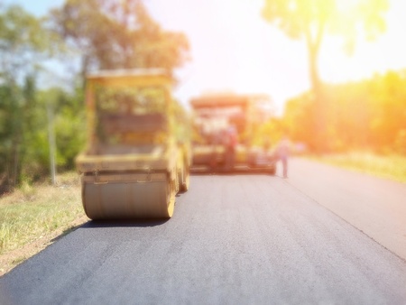 Asphalt road construction in Asia, blurred images