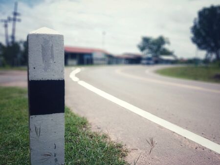 After navigating the curves on the side of the road to help guide the vehicleの写真素材