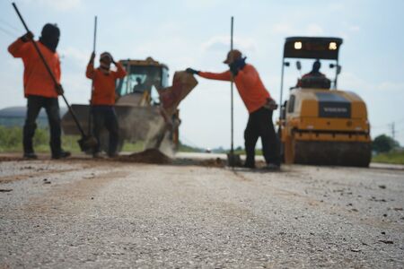 Repairing a damaged road For people to use the car to travel safely (blurred images)