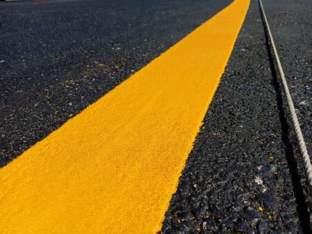 The yellow traffic line during construction is completedの写真素材