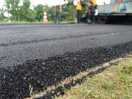 Blur image, asphalt paving With heavy machinery in Thailandの写真素材