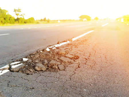 Damaged cracks in the road Dangerous for traffic in thailand
