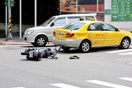 Taipei,Taiwan-July 4 a car accident that a motorbike hit a taxi in Taipei city,2011 in Taipei,Taiwanのeditorial素材