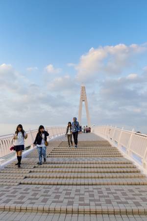 people free walking on  a bridge against blue cloudy sky in Taipeiのeditorial素材