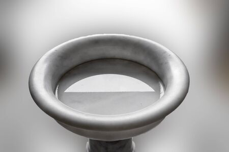 religious wash hand tub isolatedの写真素材