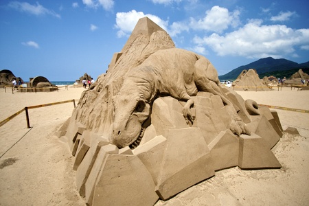 FULONG, TAIWAN-MAY 23,2012:a dinosaur sand sculpture at Fulong beach for celebrating the Sand Sculpture Festival on May 23,2012 in Fulong,Taiwanのeditorial素材