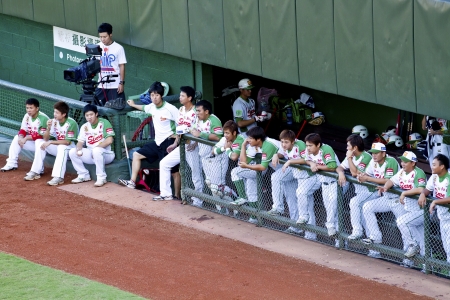 Tianmu, Taiwan - September 1,2012 : Sinon Bulls players of CPBL, watching for the Chinese Professional Baseball League game at rest area on September 1, 2012 at Tianmu Stadium, Taipei, Taiwan.のeditorial素材