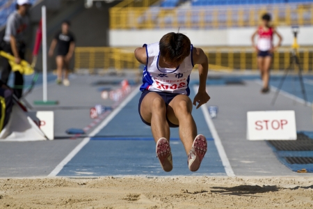 TAIPEI,TAIWAN -October 26,2012:athlete in the all-Taiwan national track and field games in Taipei stadium on October 26,2012 in Taipei,Taiwanのeditorial素材