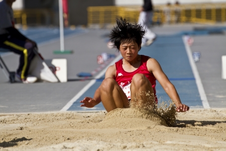 TAIPEI,TAIWAN -October 26,2012:athlete in the all-Taiwan national track and field games in Taipei stadium on October 26,2012 in Taipei,Taiwanのeditorial素材
