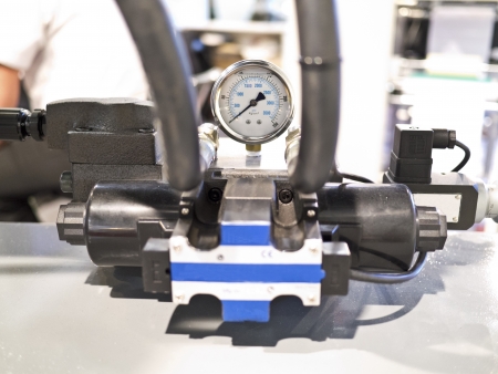 Closeup of printng machine working part with white light