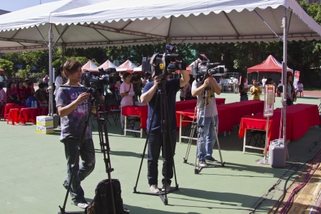 NEW TAIPEI CITY,TAIWAN -November 3,2012:cameraman in LuZhou elementary School for recording the...