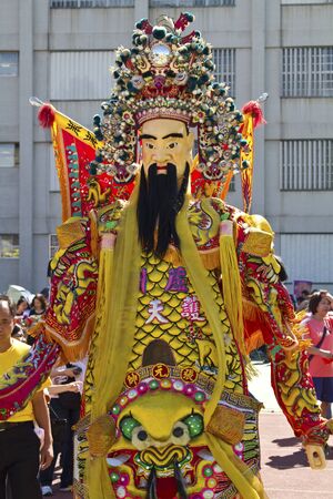 man-size puppet or costume worn by temple worker during parades. It forms a core part of Chinese Culture.のeditorial素材