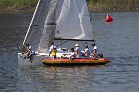 TAIPEI,TAIWAN -November 10,2012:Keel Boat Sailing on river in 2012 Taipei Keel Boat Competition in Dadaocheng Wharf on November 10,2012 in Taipei,Taiwanのeditorial素材