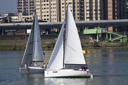 TAIPEI,TAIWAN -November 10,2012:Keel Boat Sailing on river in 2012 Taipei Keel Boat Competition in Dadaocheng Wharf on November 10,2012 in Taipei,Taiwanのeditorial素材