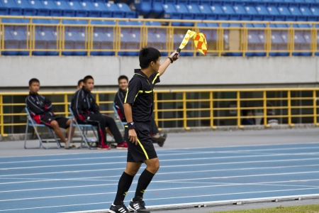TAIPEI,TAIWAN -November 14,2012:umpire in the All-Taiwan Intercity Football Competition in Taipei...