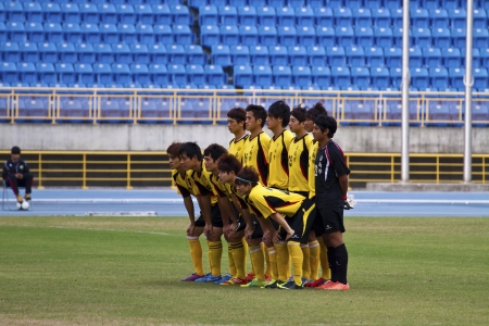TAIPEI,TAIWAN -November 14,2012:football players in the All-Taiwan Intercity Football Competition in Taipei stadium on November 14,2012 in Taipei,Taiwanのeditorial素材