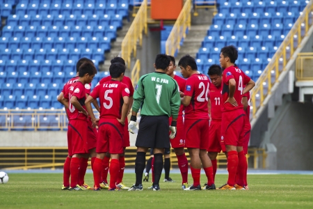 TAIPEI,TAIWAN -November 14,2012:football players in the All-Taiwan Intercity Football Competition in Taipei stadium on November 14,2012 in Taipei,Taiwanのeditorial素材