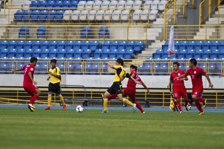 TAIPEI,TAIWAN -November 14,2012:football players in the All-Taiwan Intercity Football Competition in Taipei stadium on November 14,2012 in Taipei,Taiwanのeditorial素材