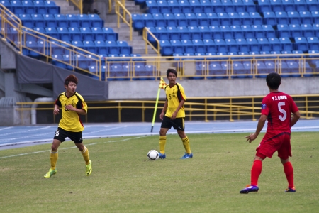TAIPEI,TAIWAN -November 14,2012:football players in the All-Taiwan Intercity Football Competition in Taipei stadium on November 14,2012 in Taipei,Taiwanのeditorial素材