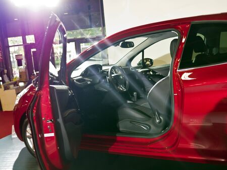TAIPEI,TAIWAN -December 21 : red new car of peugeot 208 in 2013 New Car Exhibition in Taipei world...