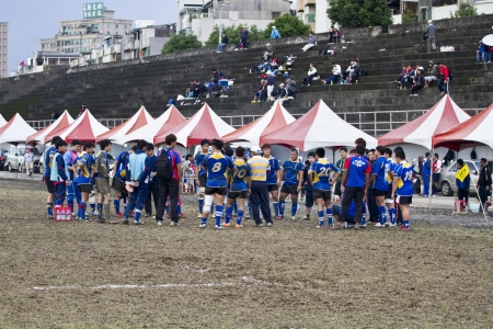 TAIPEI,TAIWAN - December 13 : unidentified rugby football players in the All-Taiwan rugby Football Competition in Taipei Bailing Rugby  Fields on December 13,2012 in Taipei,Taiwanのeditorial素材