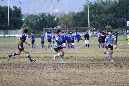 TAIPEI,TAIWAN - December 13 : unidentified rugby football players in the All-Taiwan rugby Football Competition in Taipei Bailing Rugby  Fields on December 13,2012 in Taipei,Taiwanのeditorial素材