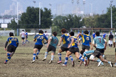 TAIPEI,TAIWAN - December 13 : unidentified rugby football players in the All-Taiwan rugby Football Competition in Taipei Bailing Rugby  Fields on December 13,2012 in Taipei,Taiwanのeditorial素材
