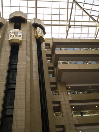The interior of a modern building with an elevator.