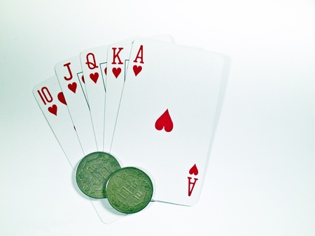 A royal straight flush playing cards poker hand in hearts の写真素材