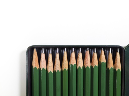 a box of sketch pencils on white backgroundの写真素材