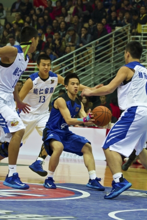 New Taipei City - March 03: player Wu participates in an HBL champion basketball game at the XinZhuang Sports  Centre on March 03, 2013 in New Taipei City, Taiwan. The NengRen high school beat the ShinRong high school.のeditorial素材