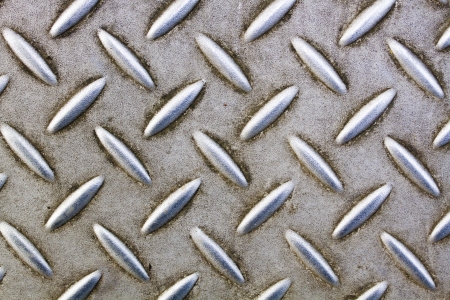 Background of metal diamond plate in silver colorの写真素材