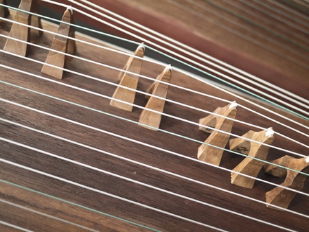 Strings and bridges of Chinese ancient instrument Gu Zheng