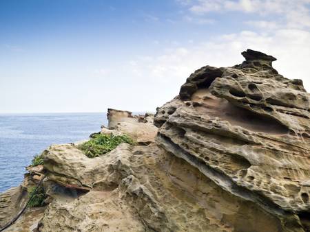 panoramic view of nice colorful huge cliff and sea on the backの写真素材