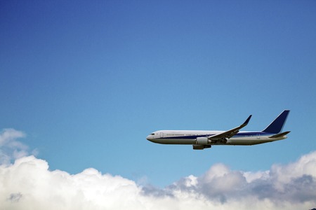 business passenger airplane in the airの写真素材