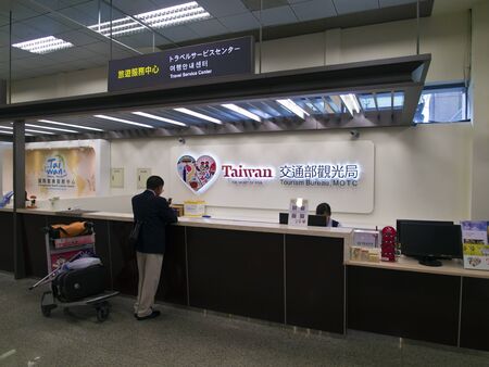 Taipei, Taiwan - JUNE 27, 2015: Travel Service Center of Tourism bureau in Taipei Songshan Airport on June 27,2015 in Taipei,Taiwan.のeditorial素材