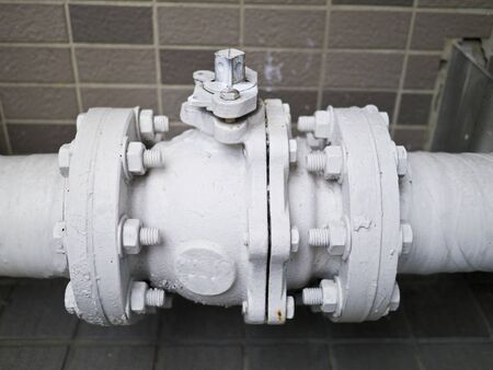 High pressure white steel pipe connection outdoors